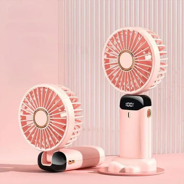 Ventilateur de poche portable rose, rechargeable via USB, avec écran LED et socle détachable, compact et élégant pour une utilisation quotidienne.